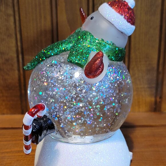 Color Changing Light Up Skiing Snowman Snow Globe - Picture 2 of 4